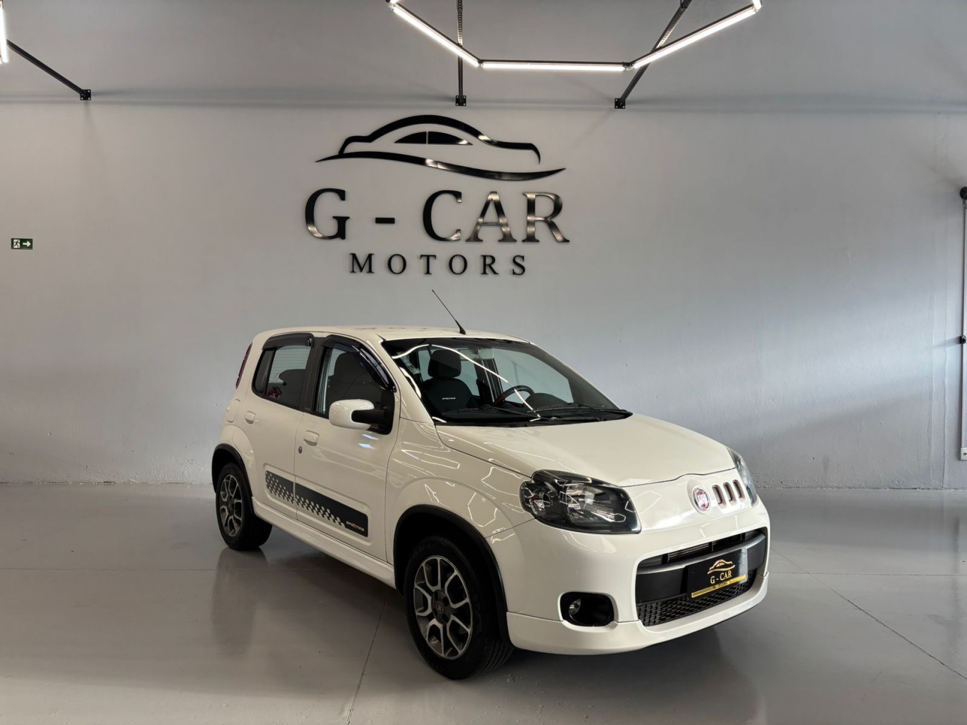 Foto Uno Sporting 1.4 Evo Fire Flex 8v 4p