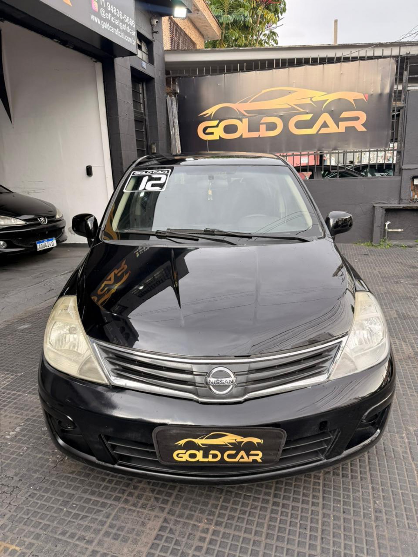 Foto Tiida S 1.8/1.8 Flex 16v  Mec.